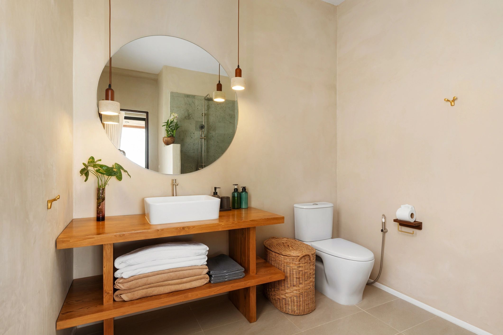 Minimalist bathroom with refined concrete-style surfaces